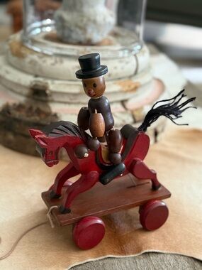 Vintage Wooden Decorative Horse and Rider with Red and Black Accents Toy